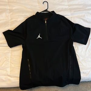 Jordan short sleeve coaches jacket.